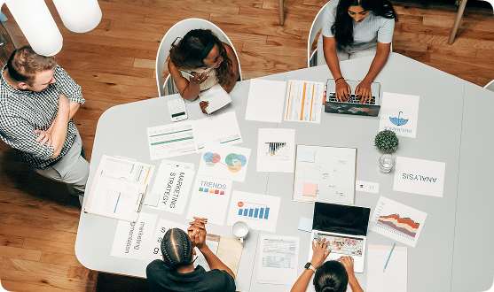 Team collaborating on AI solutions in a modern office environment